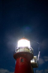 Starry night at old lighthouse