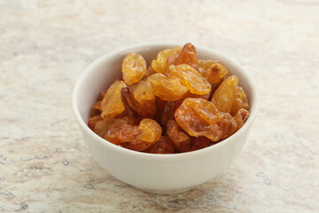 Sweet yellow raisin in the bowl