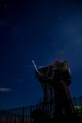 Starry night at old lighthouse