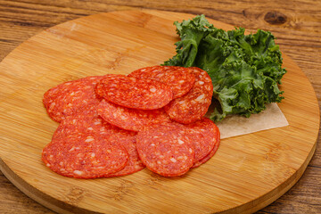Italian spycy pepperoni sausage slices
