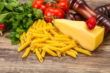 Raw penne rigate for cooking
