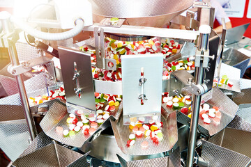 Industrial filling machine for dry candy products food