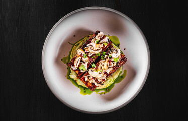 brisket and mashed potato on white plate.