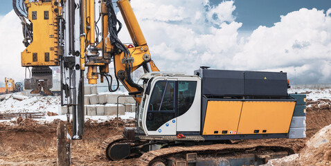 A powerful drilling rig for peeling at a construction site. Operation of the drilling rig in...