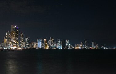 Cartagena, Bocagrande cityscape at night of bustling downtown urban panorama 