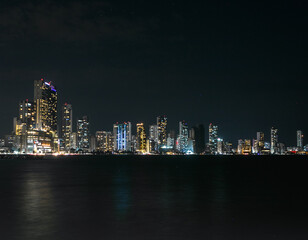 Fototapeta na wymiar Cartagena, Bocagrande cityscape at night of bustling downtown urban panorama 
