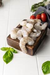 Thawed peeled shrimp, seafood, delicacy. on a white background, in a dish. beautiful product presentation