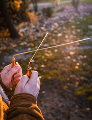 Man holding dowsing rod outside