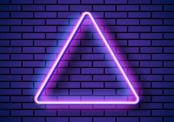 Neon frame with triangle shape on the blue brick wall. Classic rectangular 80s styled purple shiny glowing neon sign.