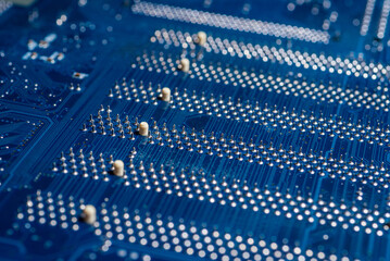 Electronic circuit board, blue color, selective focus, close-up