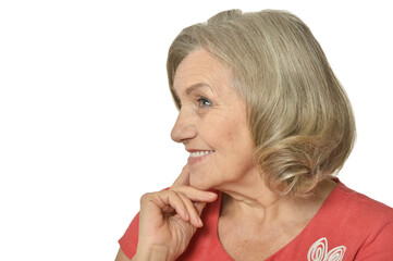 Happy senior woman posing against white background