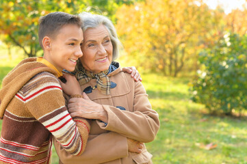 Fototapeta premium Portrait of happy grandmother and grandson posing