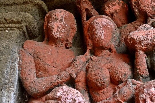 sculpture and carving at lonad caves , than city . maharashtra state , india 