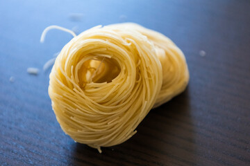 Classical dry italian pasta noodles close up