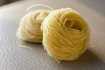 Classical dry italian pasta noodles close up
