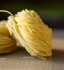 Classical dry italian pasta noodles close up