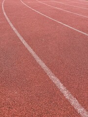 Fototapeta premium Running tracks on sports field. Concept of competition, victory, winner, loser.