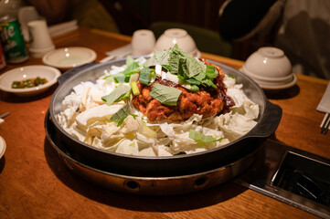 Dakgalbi barbeque chicken with vegetable mixed in pan