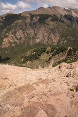 View of the Andes mountain range from Bella Vista hill rocky peak, in Bariloche, Patagonia Argentina.