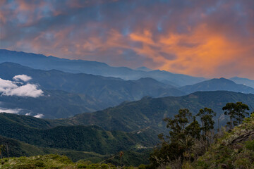 Fototapeta na wymiar Sunrise over the mountains of the Sierra Nevada de Santa Marta on the way to Lost City
