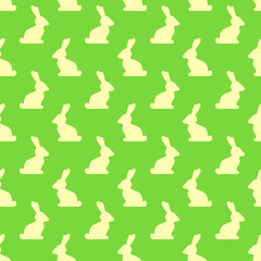 Rabbits' silhouettes seamless pattern. Vector seamless pattern in pastel green and yellow colors. Best for textile, wrapping paper, package and easter decoration.