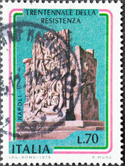 .Italy - circa 1975: a postage stamp from Italy showing a monument to the Italian Resistance...