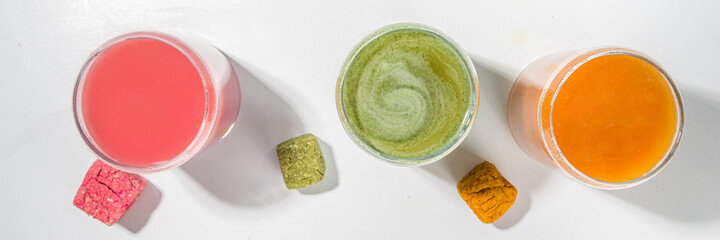 Modern Dissolvable Drinks concept, healthy homemade Dissolvable frozen dried smoothies with vegetables and fruits. Healthy organic snack on white background with frozen dried smoothie cubes 