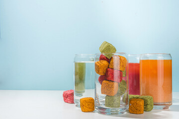 Modern Dissolvable Drinks concept, healthy homemade Dissolvable frozen dried smoothies with vegetables and fruits. Healthy organic snack on white background with frozen dried smoothie cubes 