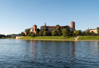 Fototapeta na wymiar Wawel Hill Kraków with the famous Royal Castle. Located on the bank of the Vistula River (Wisła) in the Old Town district. UNESCO World Heritage Site in Krakow, Poland.