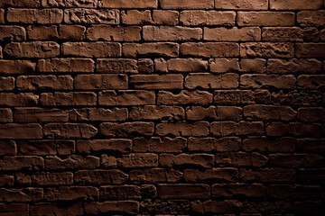 Fototapeta na wymiar Brick wall with rough red masonry. Abstract background with illumination from lantern.