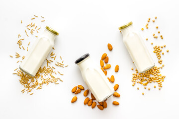 Non dairy vegan milk with nuts and cereals. Diet nutrition concept