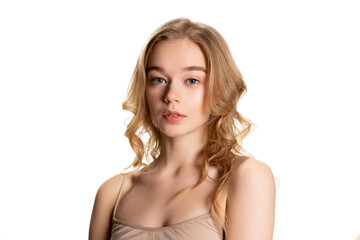 Fototapeta premium Half-length portrait of young beautiful girl with day makeup isolated over white studio background. Natural beauty concept.