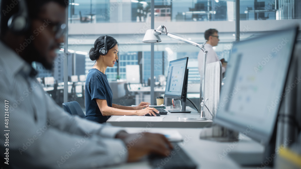 Poster professional investment traders talking into headset, working on computer with screen showing financ