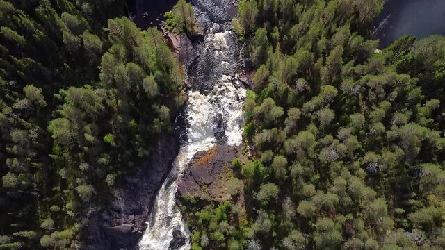 Republic of Karelia, Russia. Beautiful northern nature. River and waterfall. Northwestern Russia. Incredibly beautiful, wild forests of Karelia. The most beautiful waterfall Kumi-threshold. 