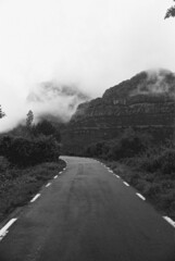 Analogic rainy day on mountain road