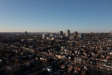 Downtown Toronto condos houses and buildings from Lansdowne and Dupont point of view in the air 