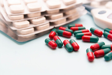 Close up pills with many capsules in background. Virus infection. Copy space.