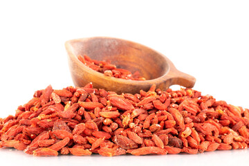 Dried sweet goji berries with wooden cup, close-up, isolated on white.