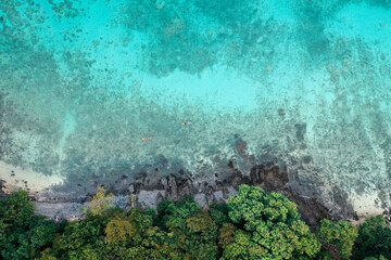 Coral island, koh He, beach and boats in Phuket province, Thailand