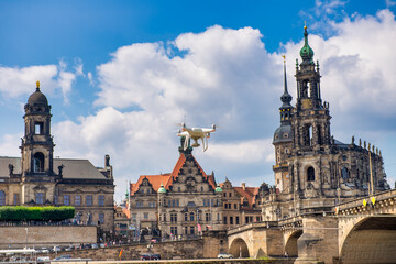 Fototapeta na wymiar DRESDEN, GERMANY - JULY 16, 2016: Dresden city landmarks and Augustus Bridge on a beautiful summer day.
