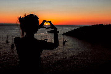 silhouette of a person on a sunset