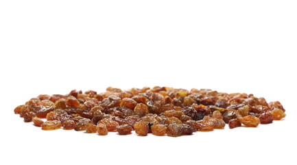Pile raisins isolated on white background