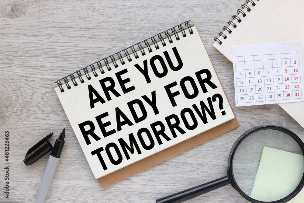 Poster are you ready for tomorrow open notepad with text on a rustic background. business concept