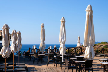 Sunbeds and umbrellas in Greek coastal resort