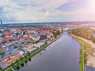 Panoramic aerial view of Lubeck cityscape on a cloudy day, Germany.