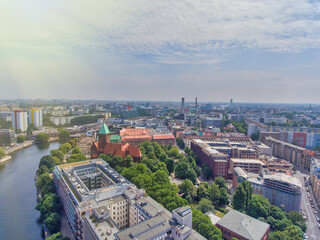 Aerial view of Berlin cityscape from drone in summer season with city landmarks and blue sky,...