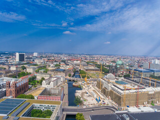 Aerial view of Berlin cityscape from drone in summer season with city landmarks and blue sky,...