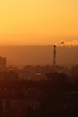 sunset over the industrial city