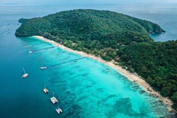 Coral island, koh He, beach and boats in Phuket province, Thailand