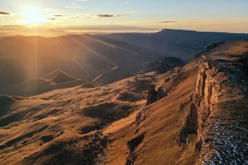 Fototapeta na wymiar aerial view of sunrise over the mountains in the North Caucasus